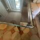 Dining table glass and wood. Italian vintage from the 80s.