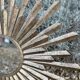 Sun mirror in patinated gold metal from the 2000s Diam 76 cm