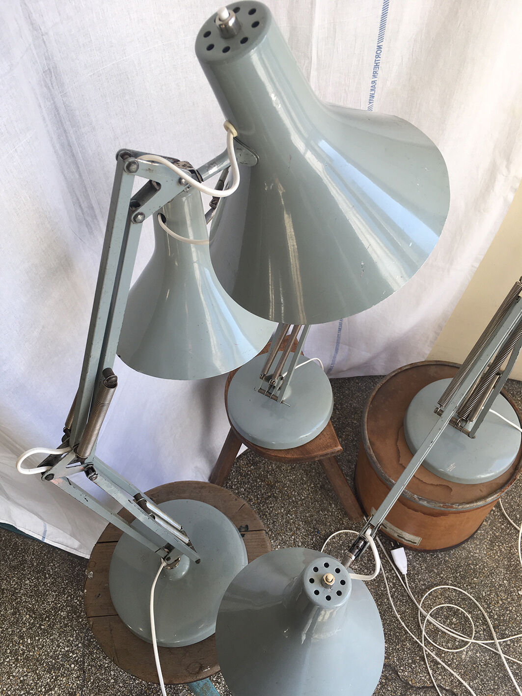 Three articulated lamps on Luxo base