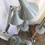 Three articulated lamps on Luxo base