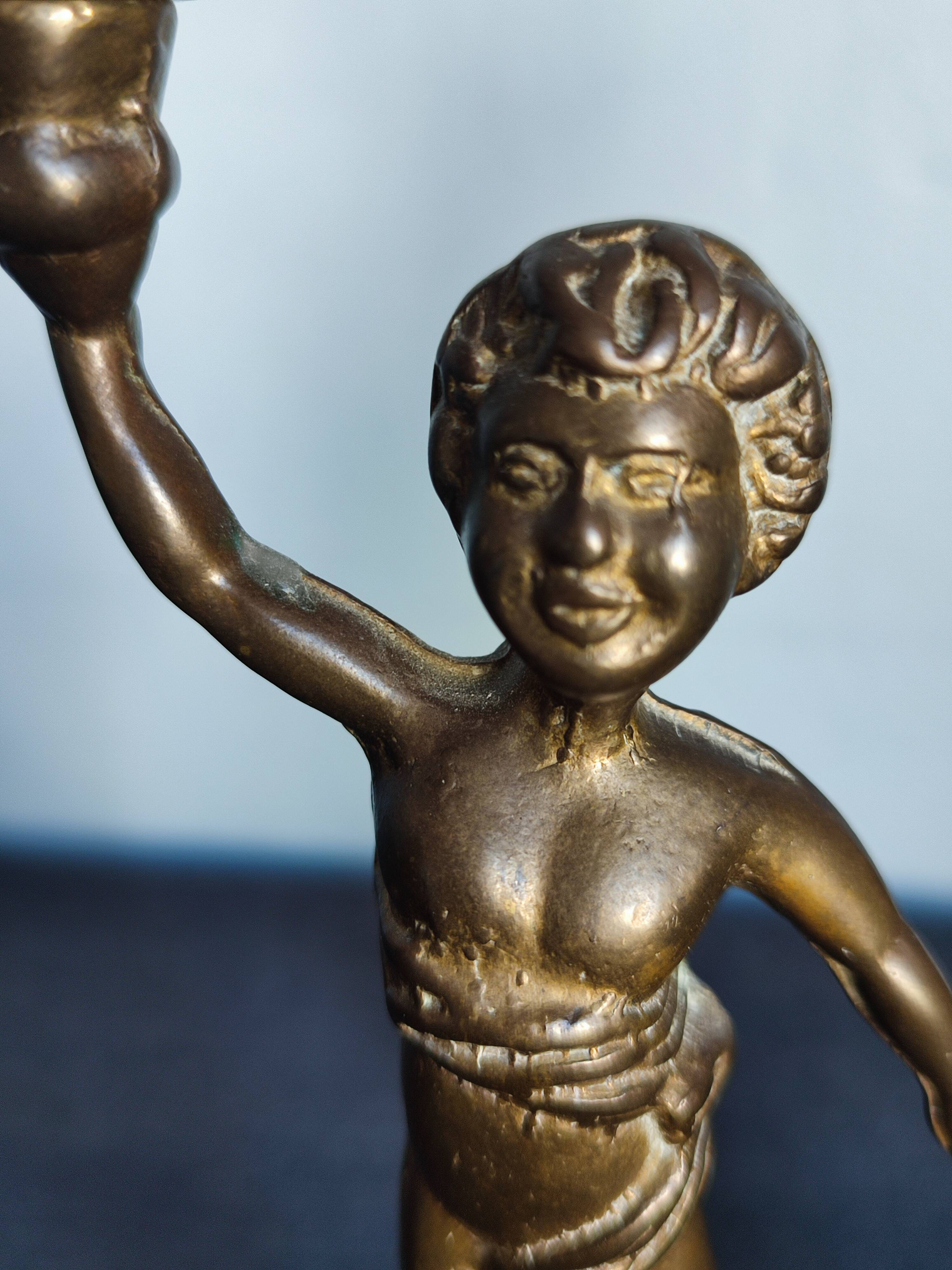 Set of two cherub cherub candlesticks