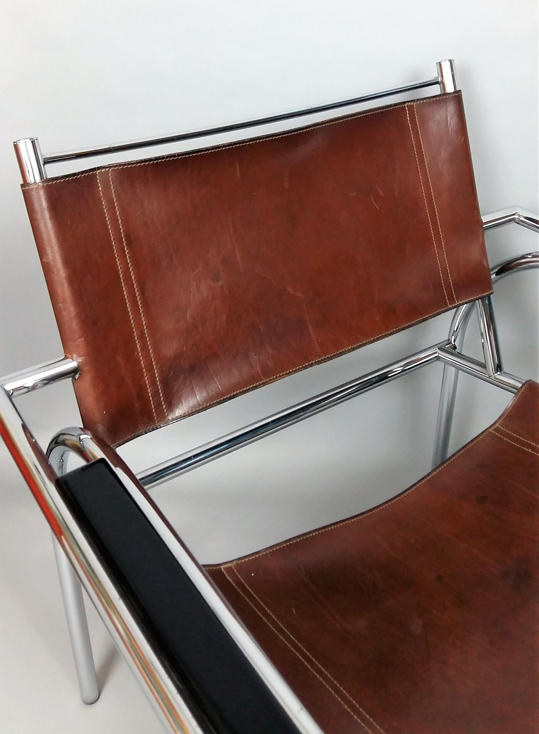 Pair of armchairs chromed metal and leather, 60 years