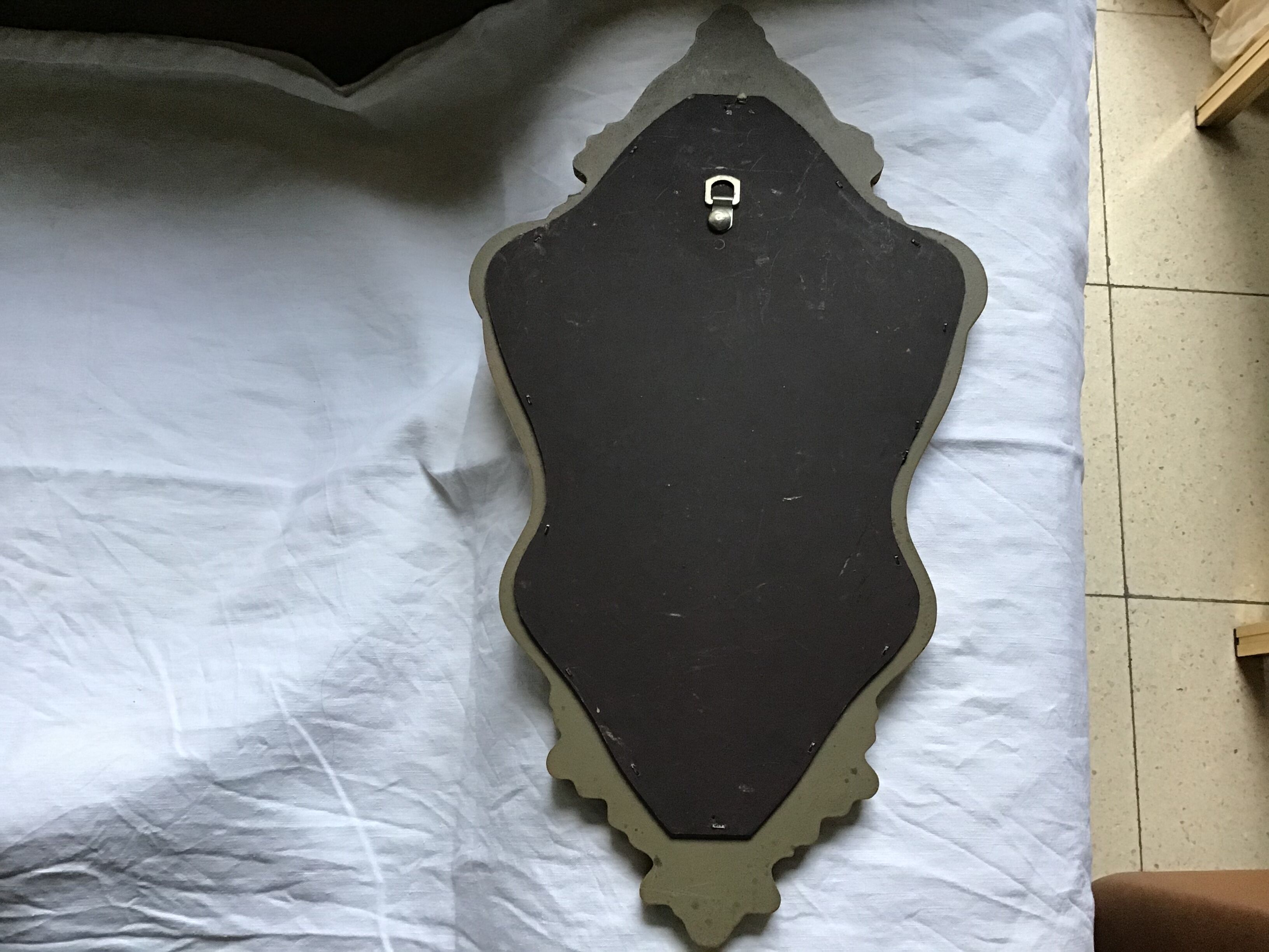 Gold and red mirror brand Deknudt