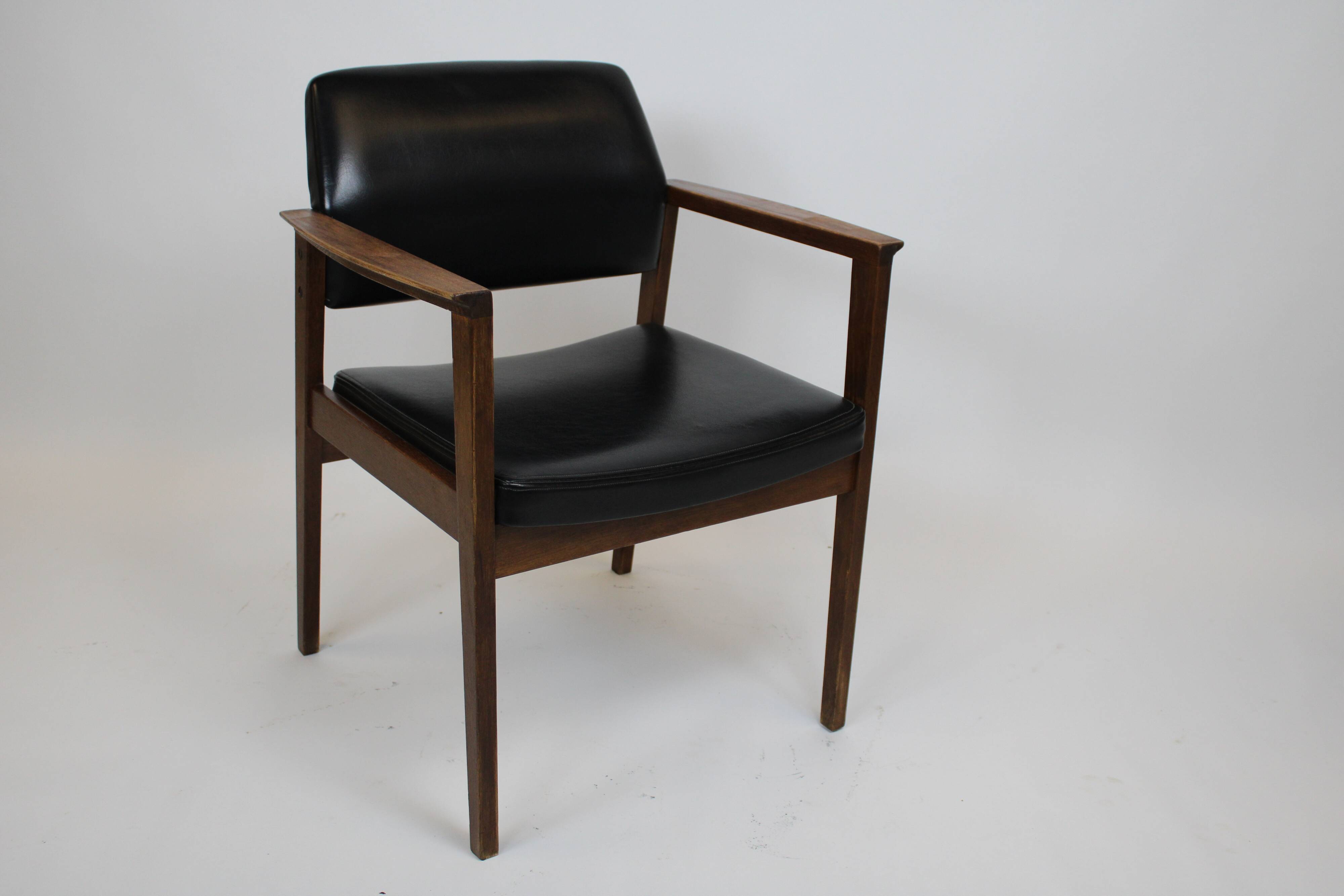Vintage armchair 1960 black imitation leather and oak frame germany