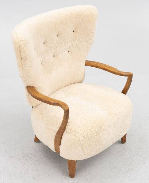 Danish armchair. upholstered with Australian lambskin. Danish Cabinmaker, 1940's
