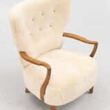 Danish armchair. upholstered with Australian lambskin. Danish Cabinmaker, 1940's