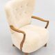 Danish armchair. upholstered with Australian lambskin. Danish Cabinmaker, 1940's