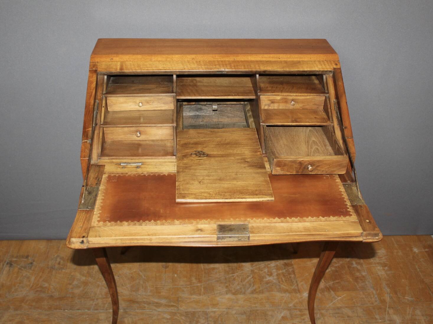 Louis XV donkey back desk in 18th century walnut