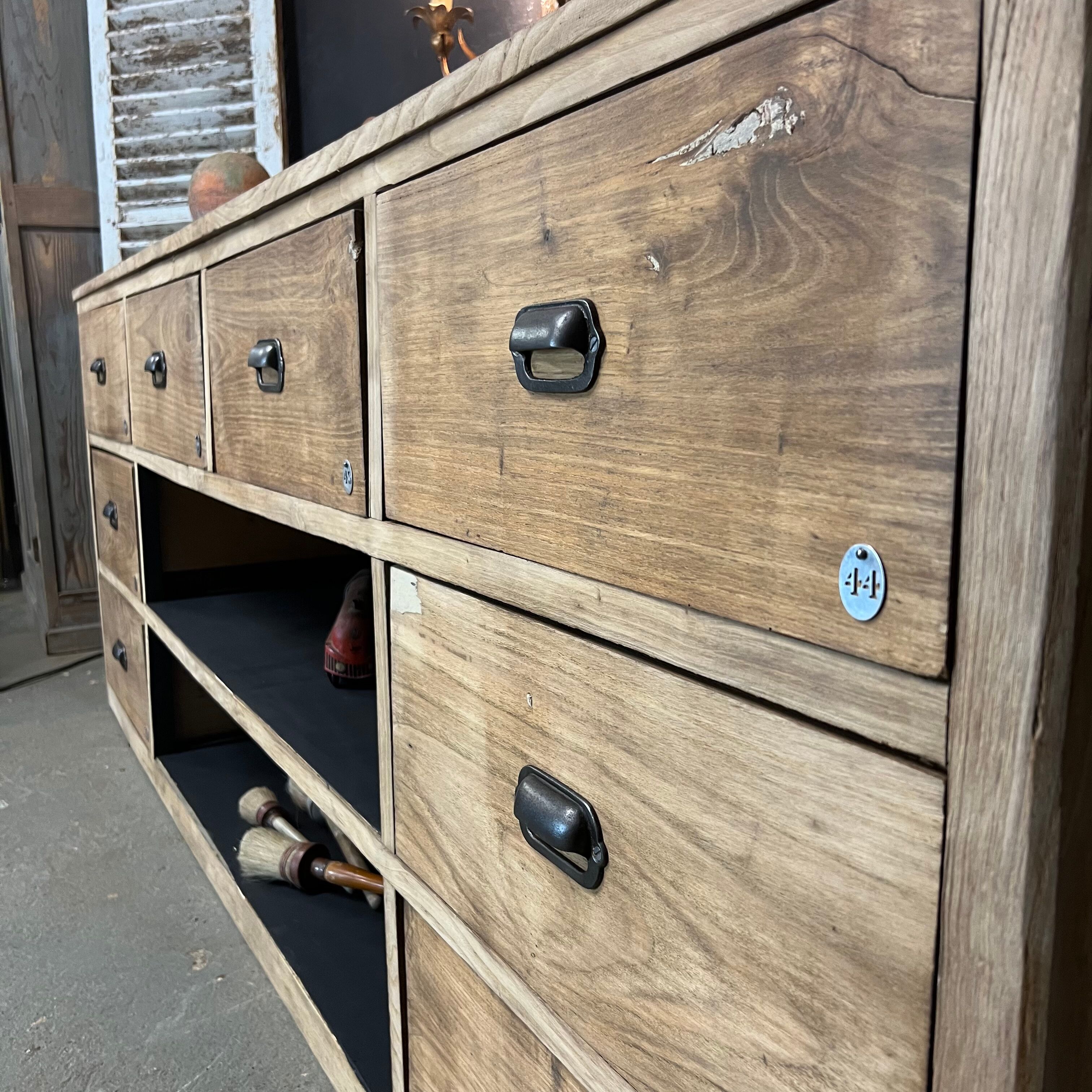 Old piece of trade furniture with chestnut drawer