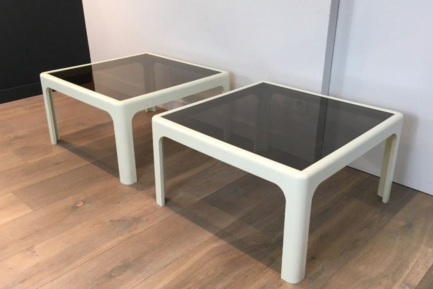 Pair of white lacquered fiberglass sofa ends