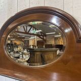 English mahogany shelf with its bevelled mirror from the early 20th century.