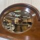 English mahogany shelf with its bevelled mirror from the early 20th century.
