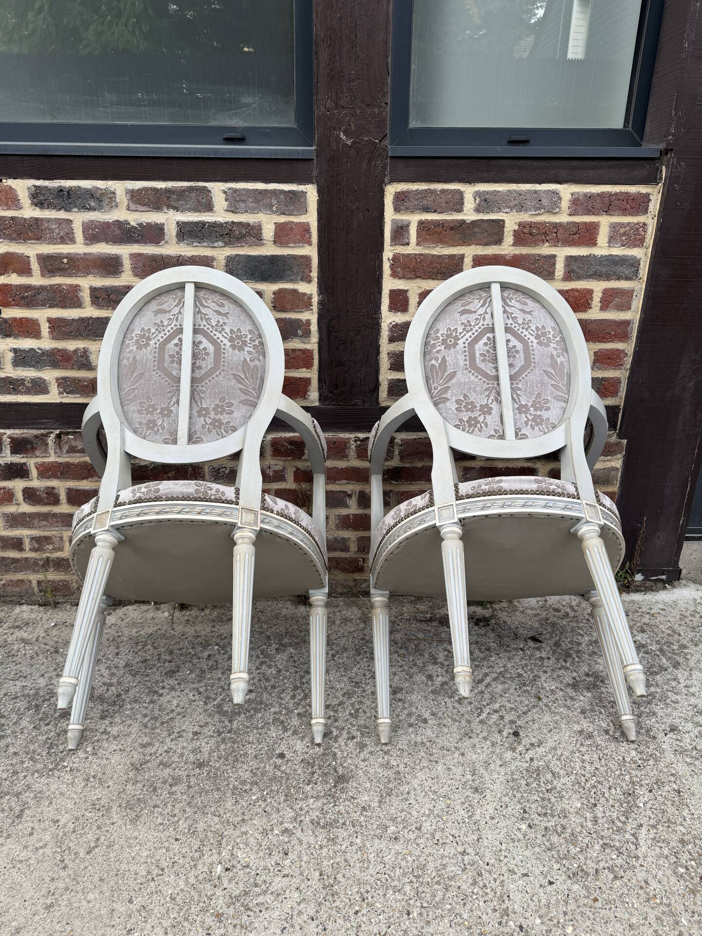 Pair of cabriole medallion armchairs in Louis XVI style