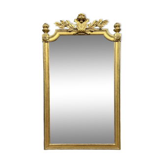 Miroir de style Louis XVI en bois doré vers 1850