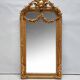 Miroir baroque doré avec guirlande de fleurs