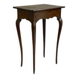 Side table with curved legs