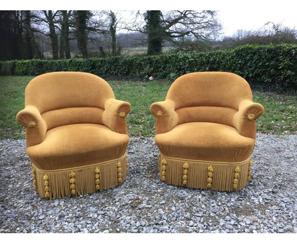 Duo de fauteuils vintage crapaud en tissu or