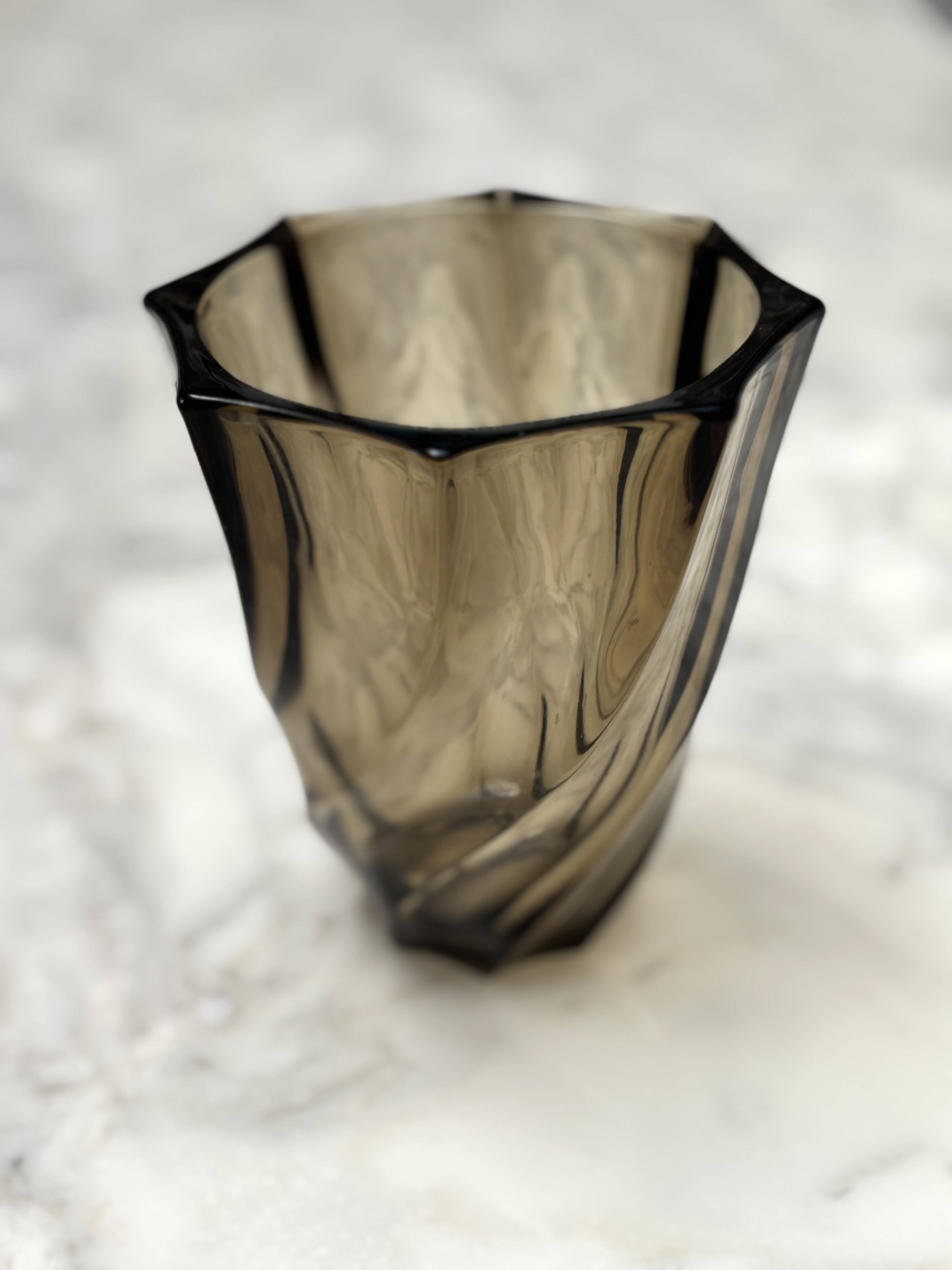 Small translucent dark brown twisted glass vase