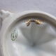 Presse-citron ancien en porcelaine de Limoges blanc et doré