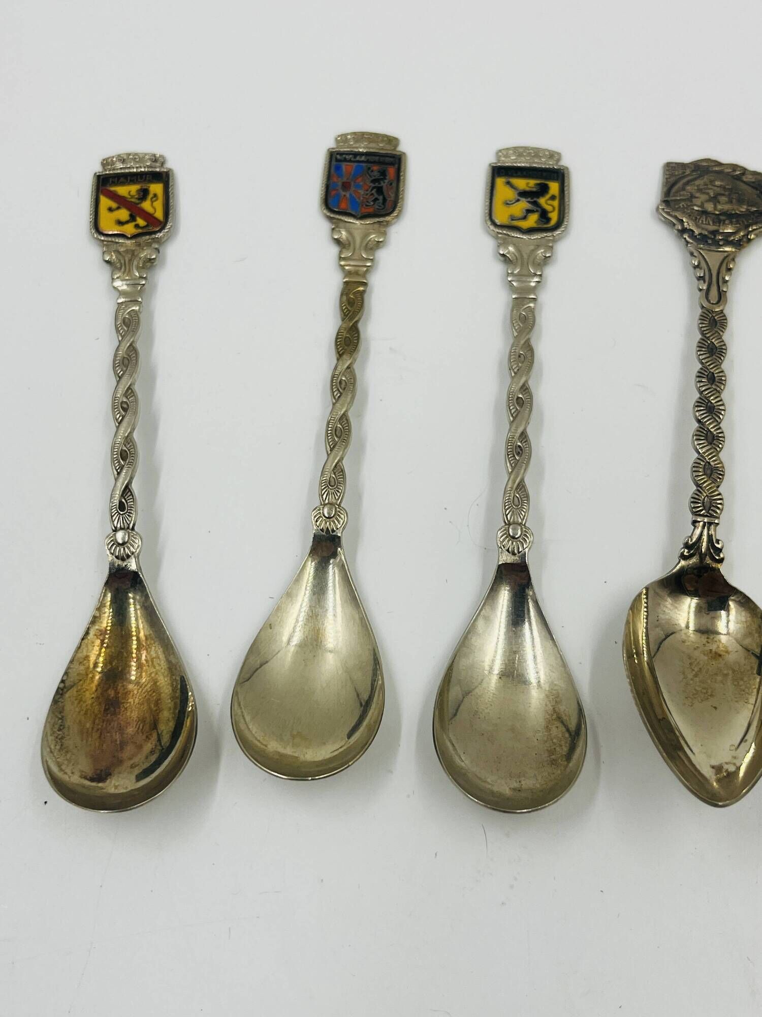 Set of 7 Heraldic Souvenir Spoons from Cities