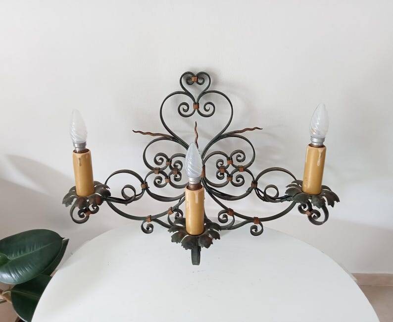 Antique wrought iron wall light from the 50s