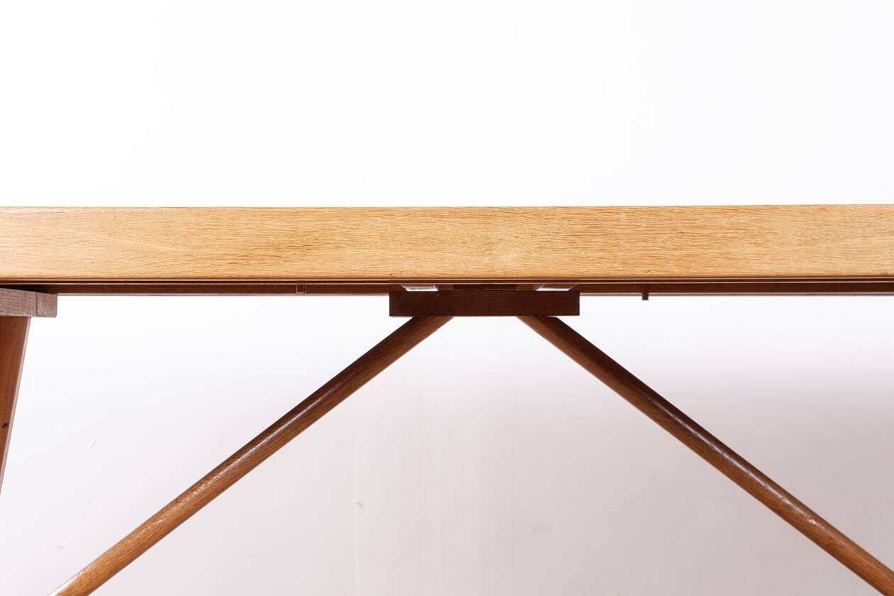 Large extendable dining table in oak by Guillerme and Chambron 1960.