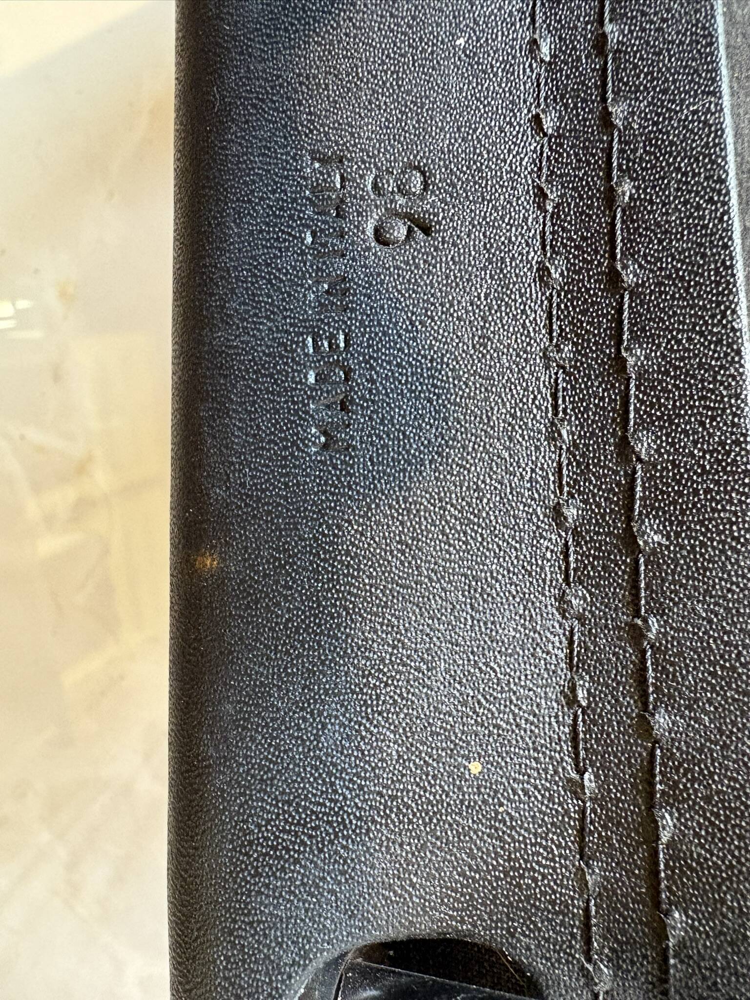 Set of 12 vintage chairs in black leather and tubular steel – Italy, 1970s