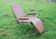 Old chaise longue in faux leather skai lama