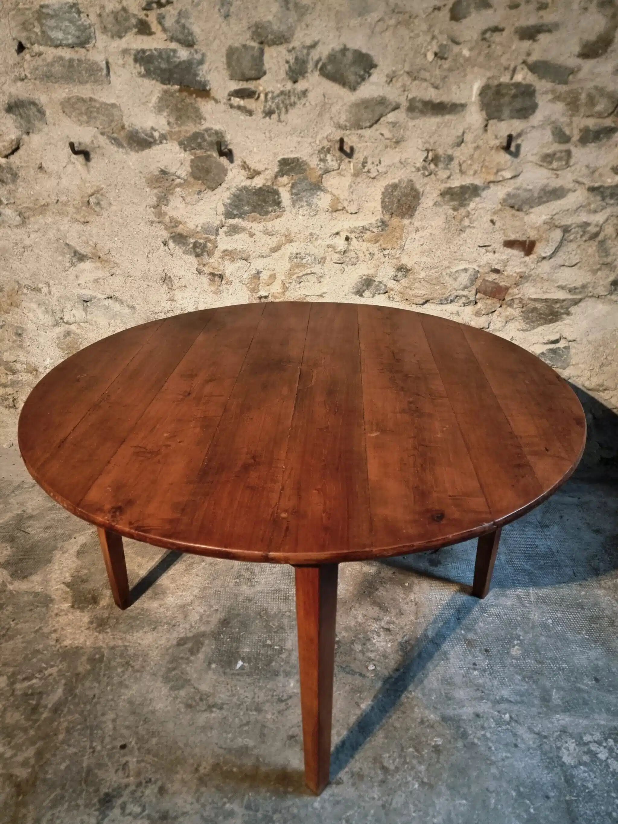 Vintage French round dining table in cherry wood, circa 1920.