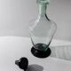 Vintage Murano glass carafe from the 1960s, green and black, with a stopper.