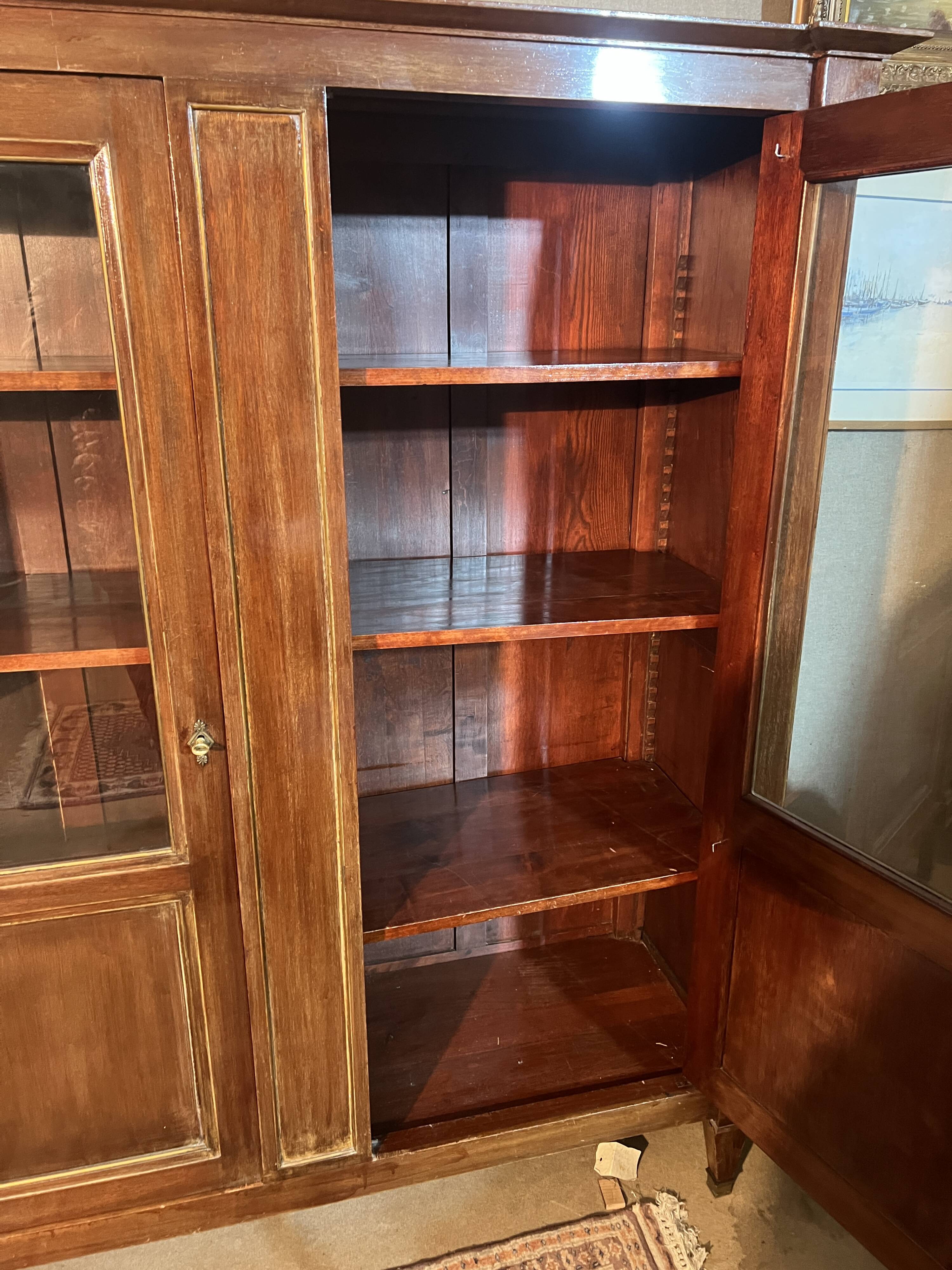 Directoire style library with two mahogany doors