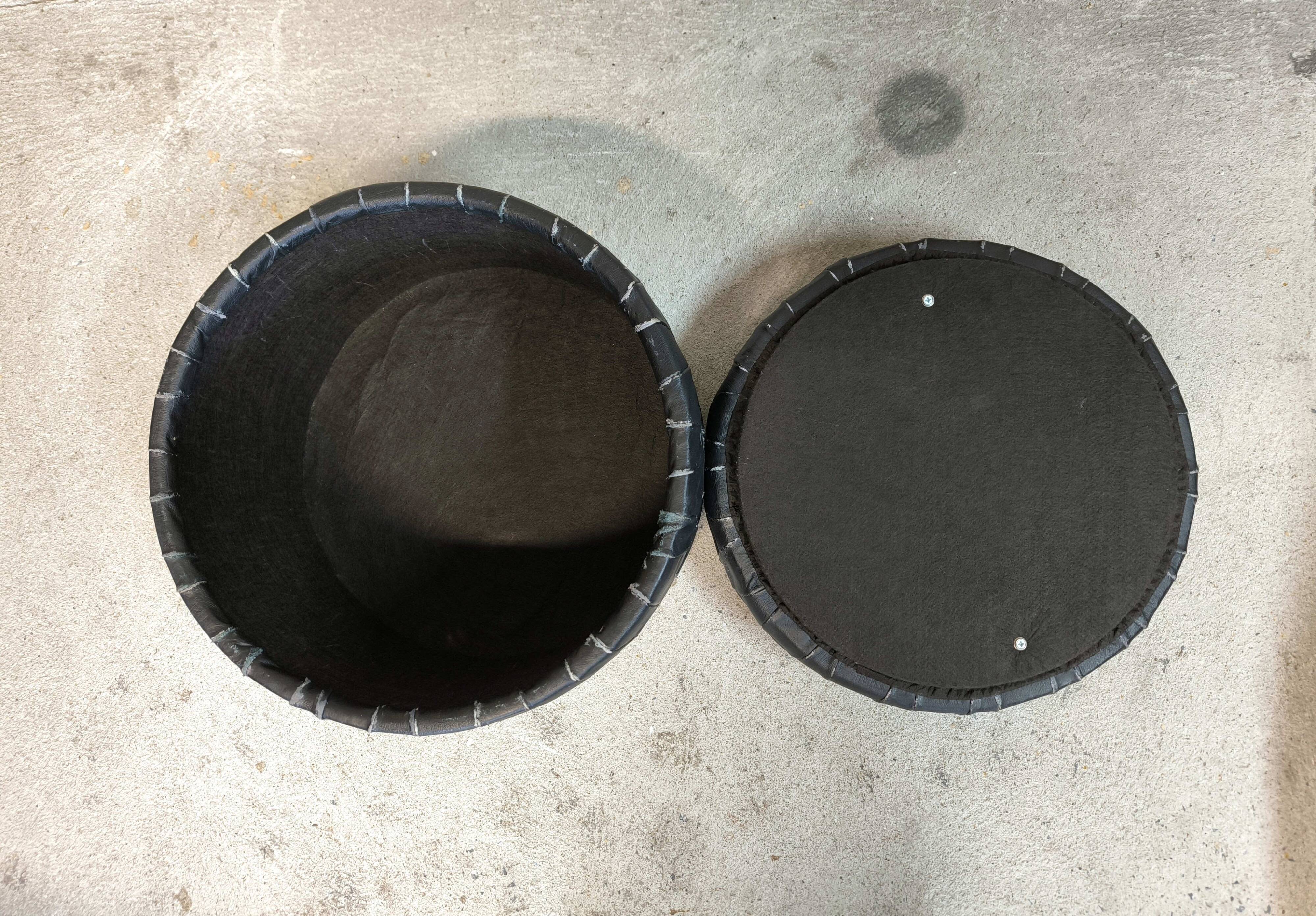 Vintage De Sede black leather storage pouf.