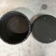 Vintage De Sede black leather storage pouf.
