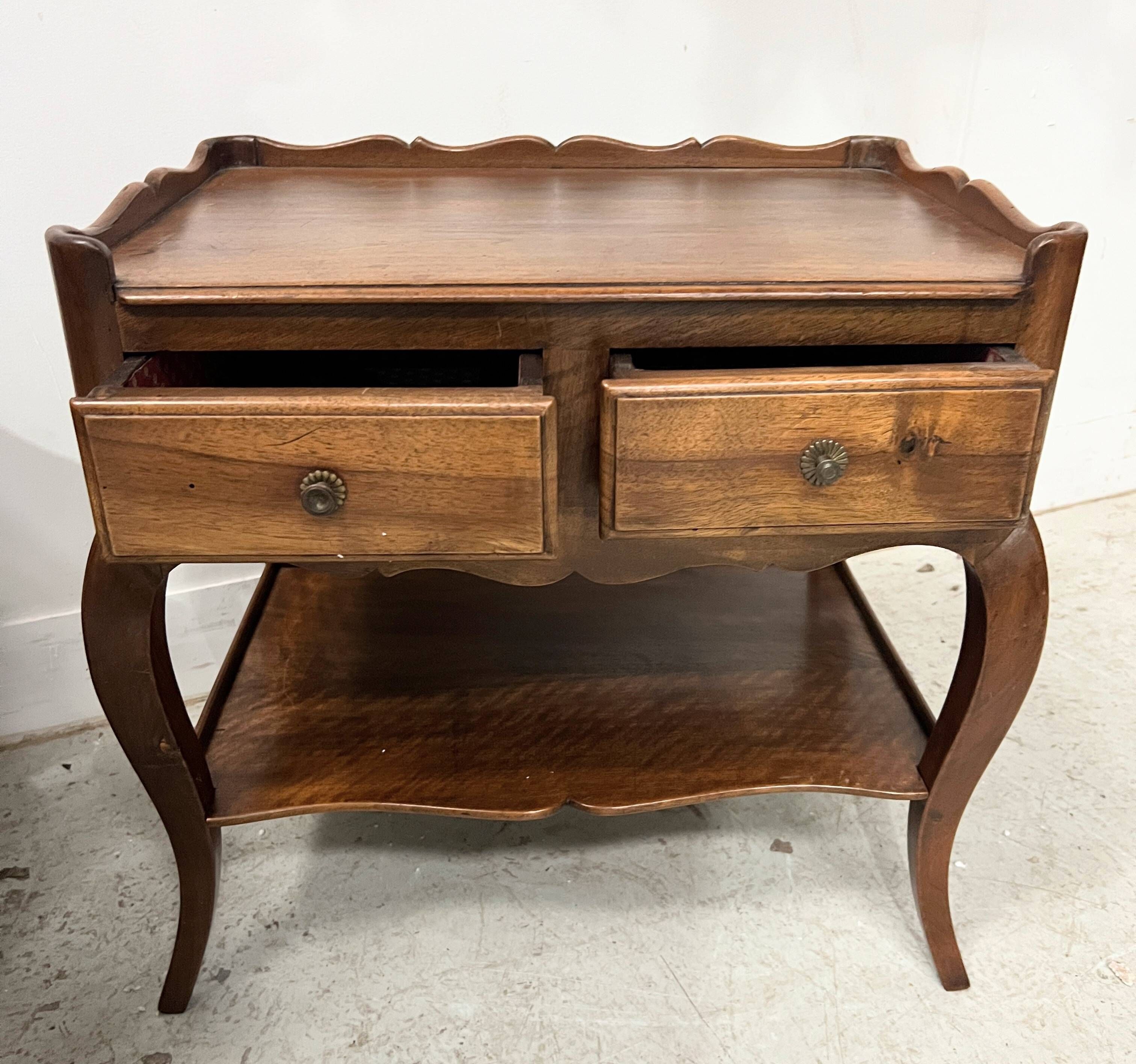 Louis XV style bedside table in solid walnut, 20th century.