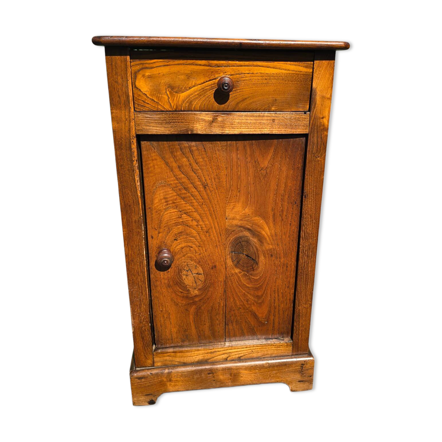 Small rustic antique bedside table made of solid wood.