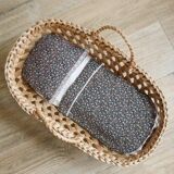 Doll bassinet with its bedding