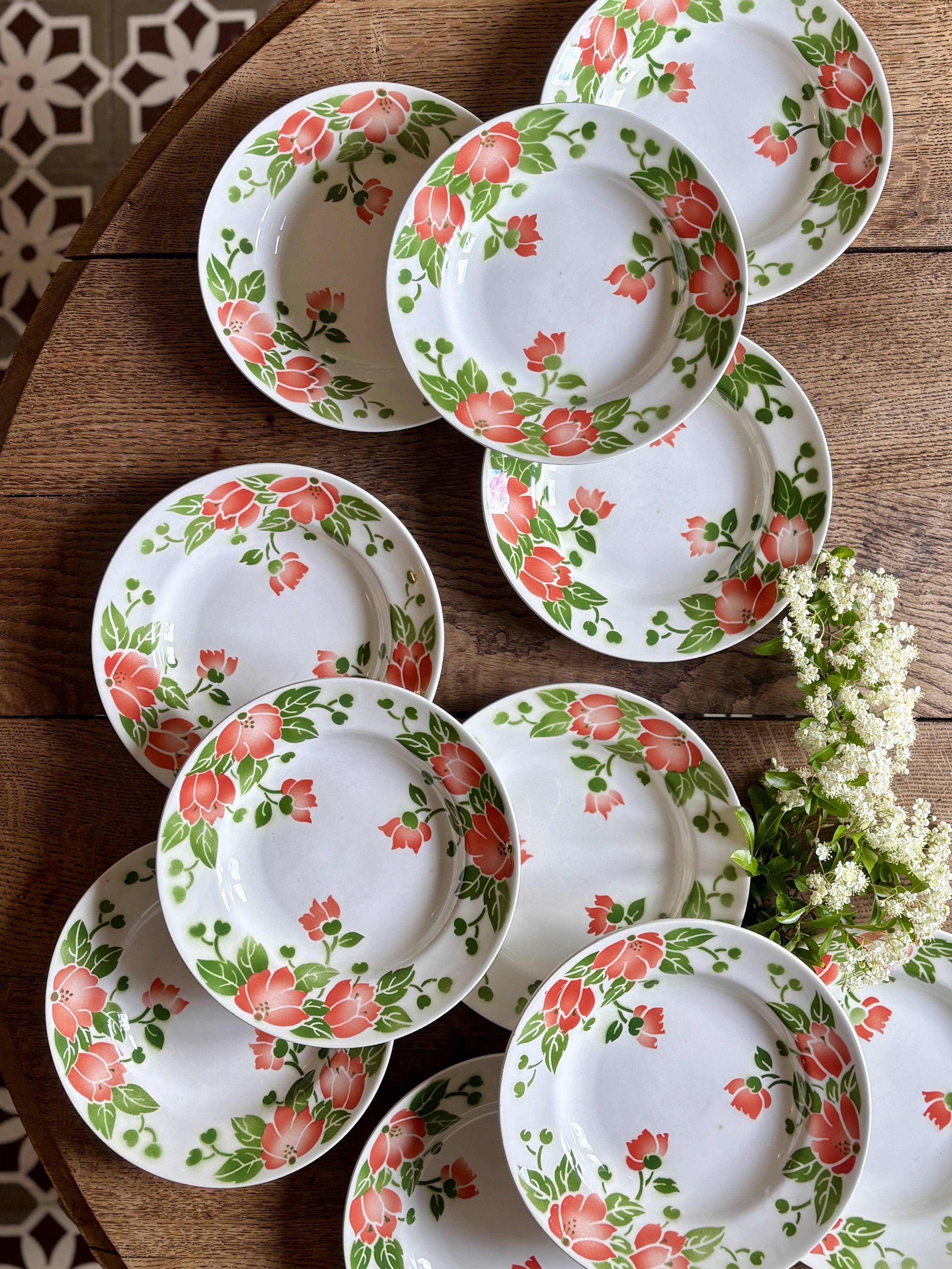 Set of 11 vintage deep plates by Eric de Moulin des Loups.