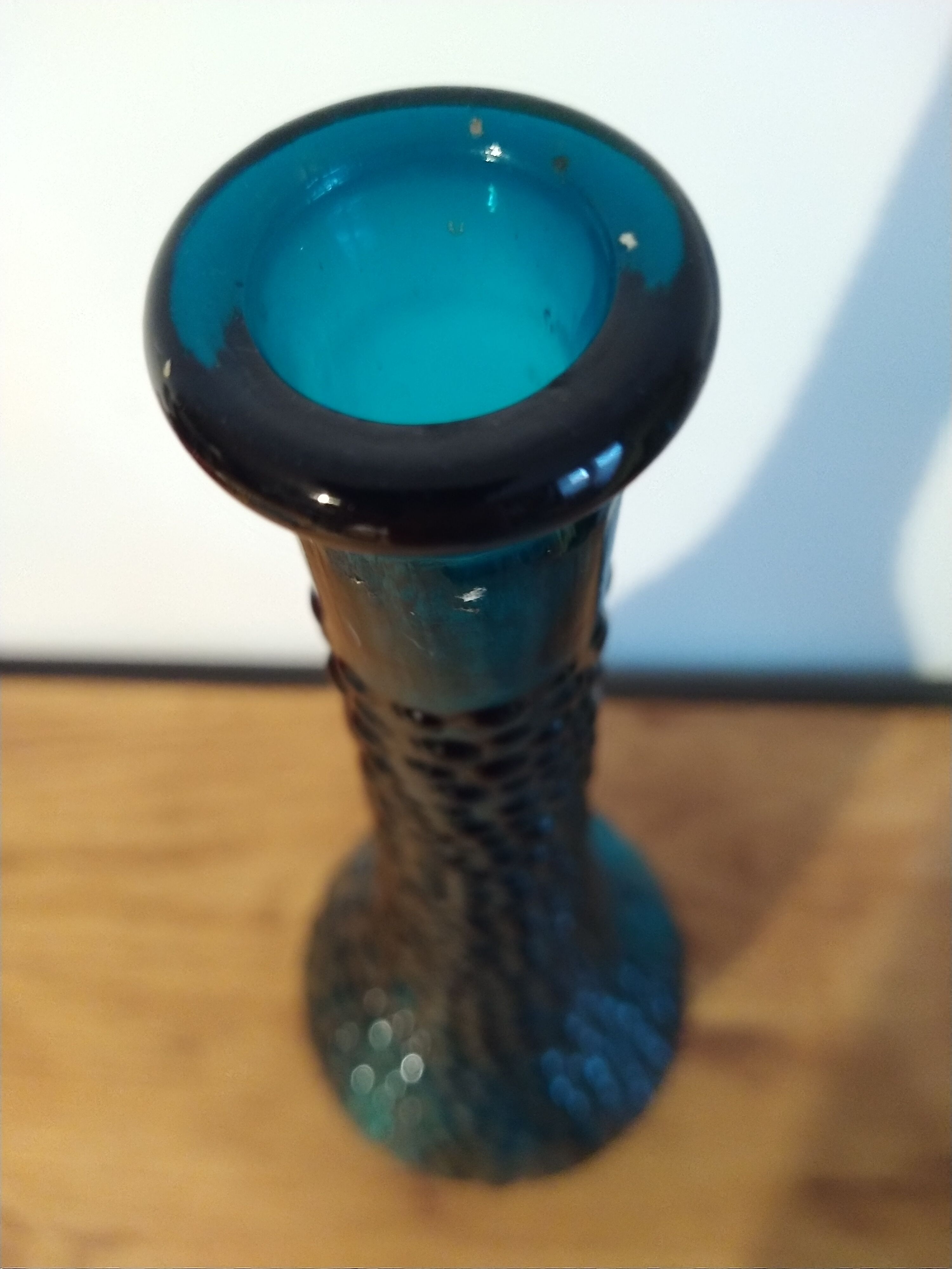 bottle made of blue vintage molded glass
