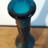 bottle made of blue vintage molded glass