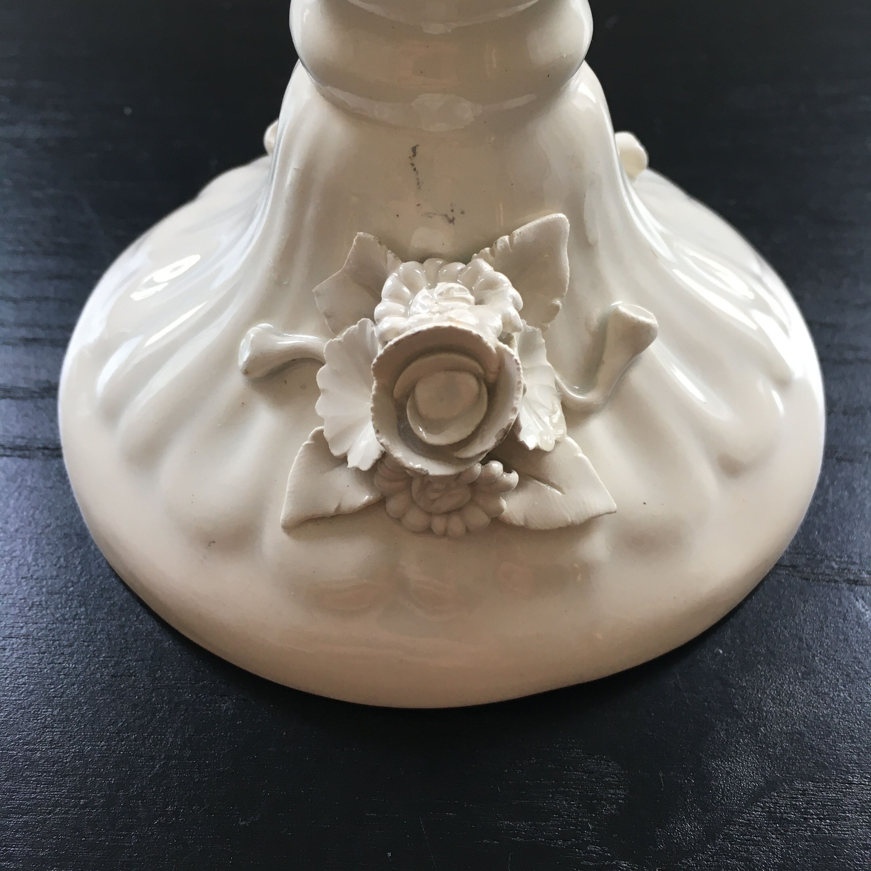 Ivory candle holder with barbotine decor