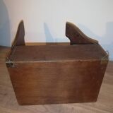 Old wooden key box cut out in the shape of a lock