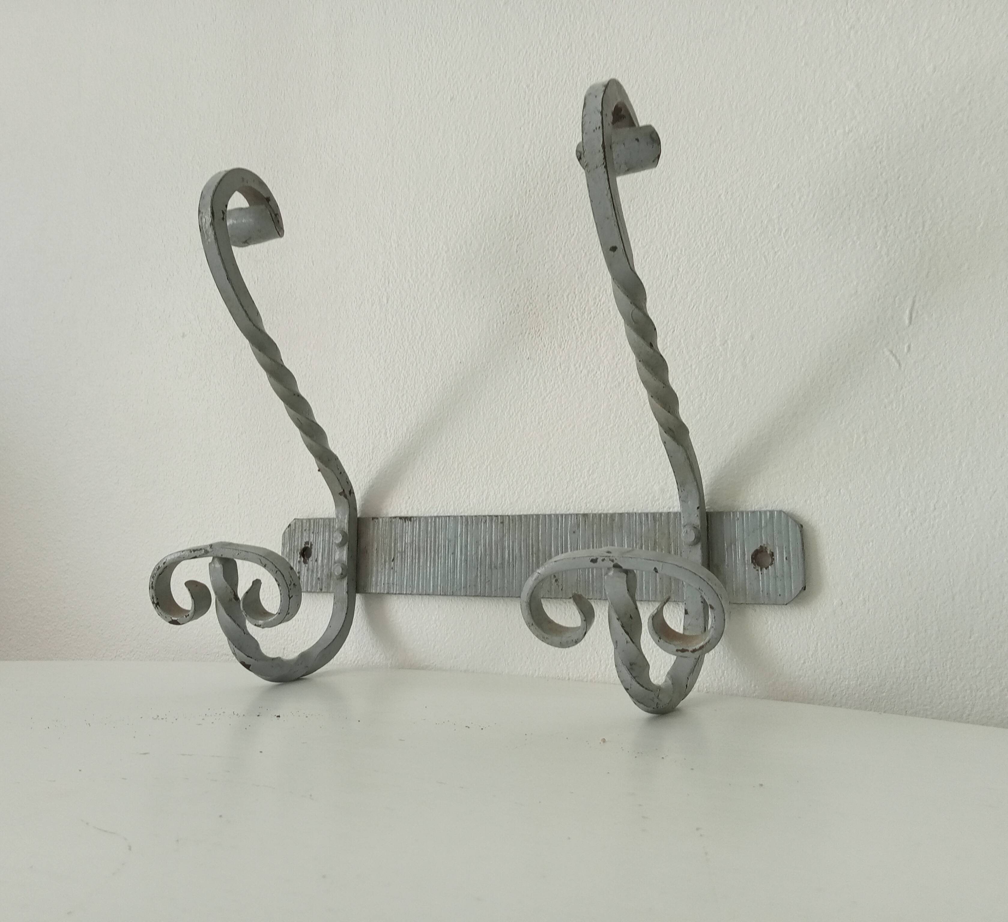 Vintage wrought iron wall coat rack