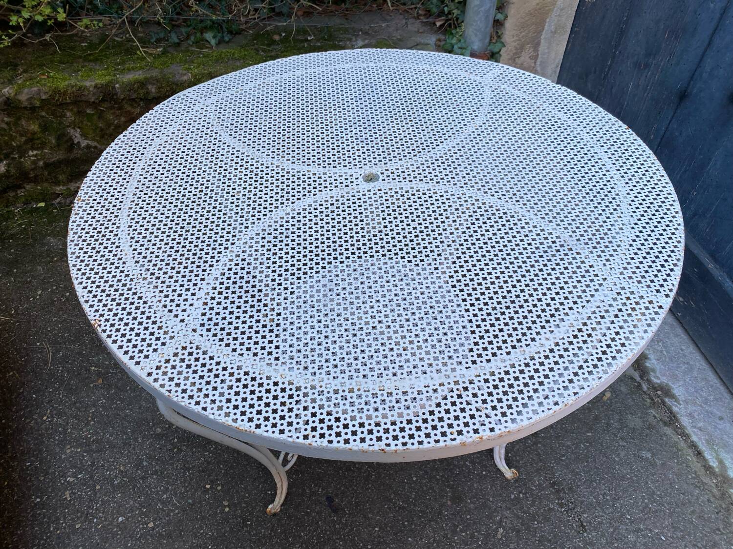 White lacquered perforated metal garden table circa 1950