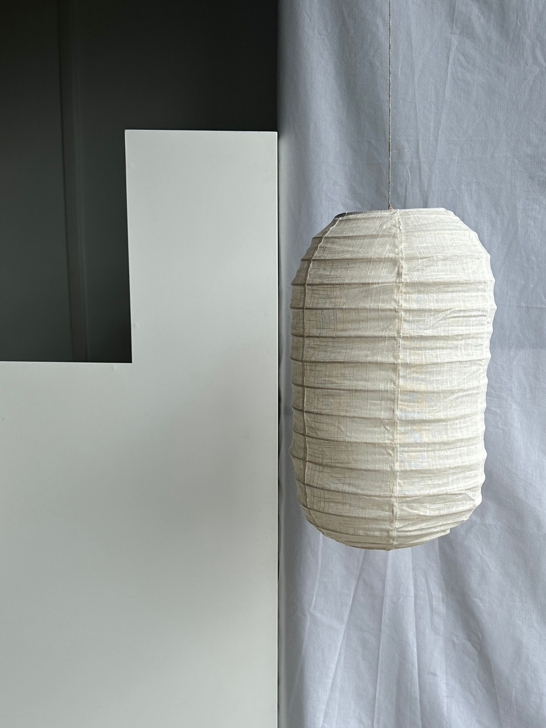 suspension in rattan and Japanese natural linen in the shape of a lantern H50 D30