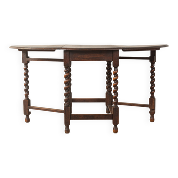 Antique gateleg table from the 1920s, solid oak