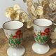 Pair of stoneware mazagrans, poppy decoration