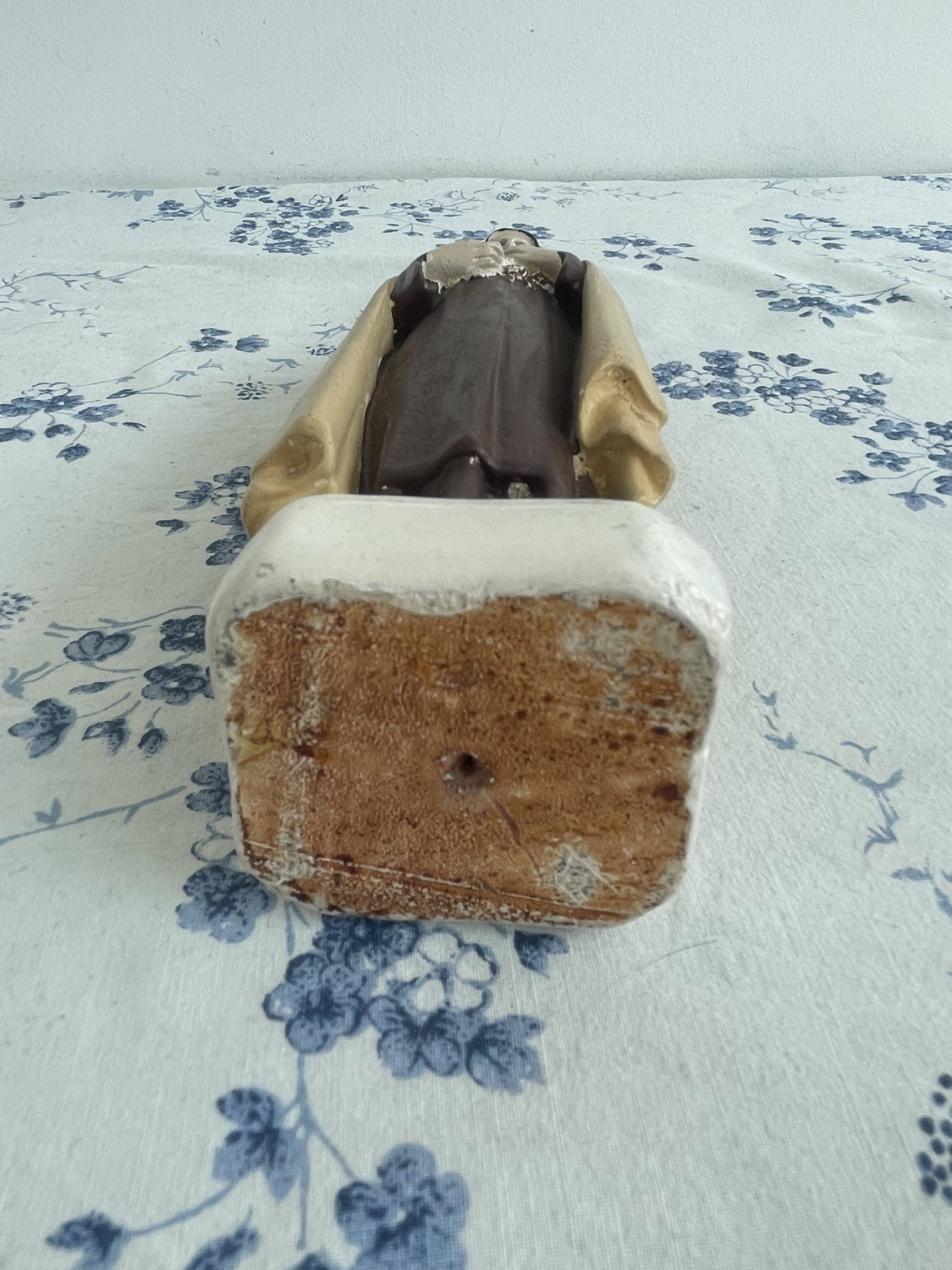 Antique statue of Saint Therese of Lisieux, religious plaster figurine