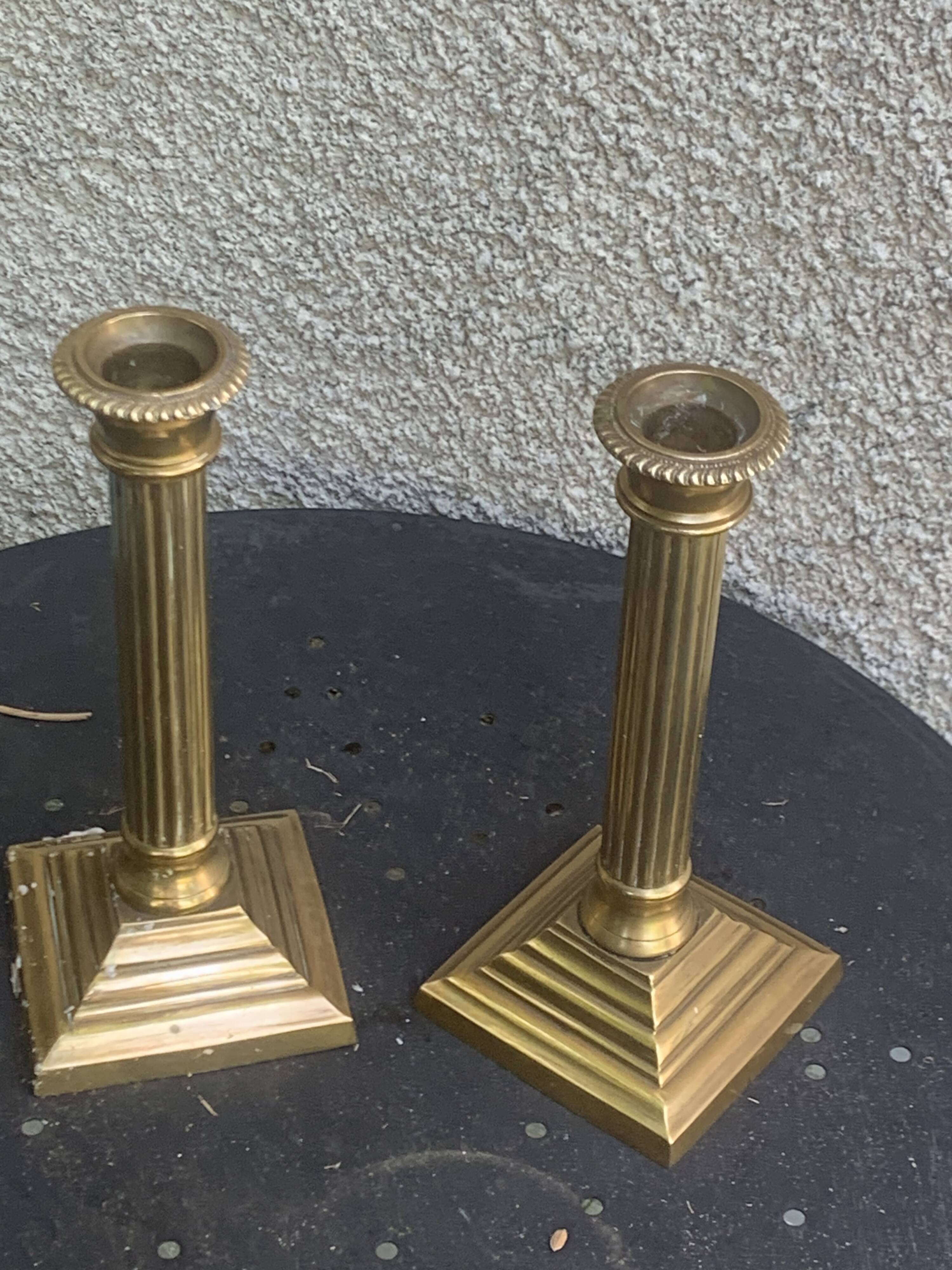 Pair of gilded brass candlesticks, vintage column shape