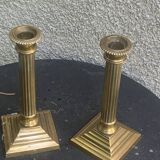 Pair of gilded brass candlesticks, vintage column shape