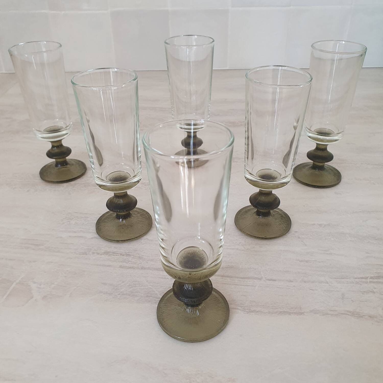 6 small green foot flutes in the Timo Sarpaneva style